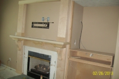 custom wood working , cabinets, hidden door, crown molding,  fire place , Houston , Austin, San Antonio,