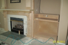 custom wood working , cabinets, hidden door, crown molding,  fire place , Houston , Austin, San Antonio,
